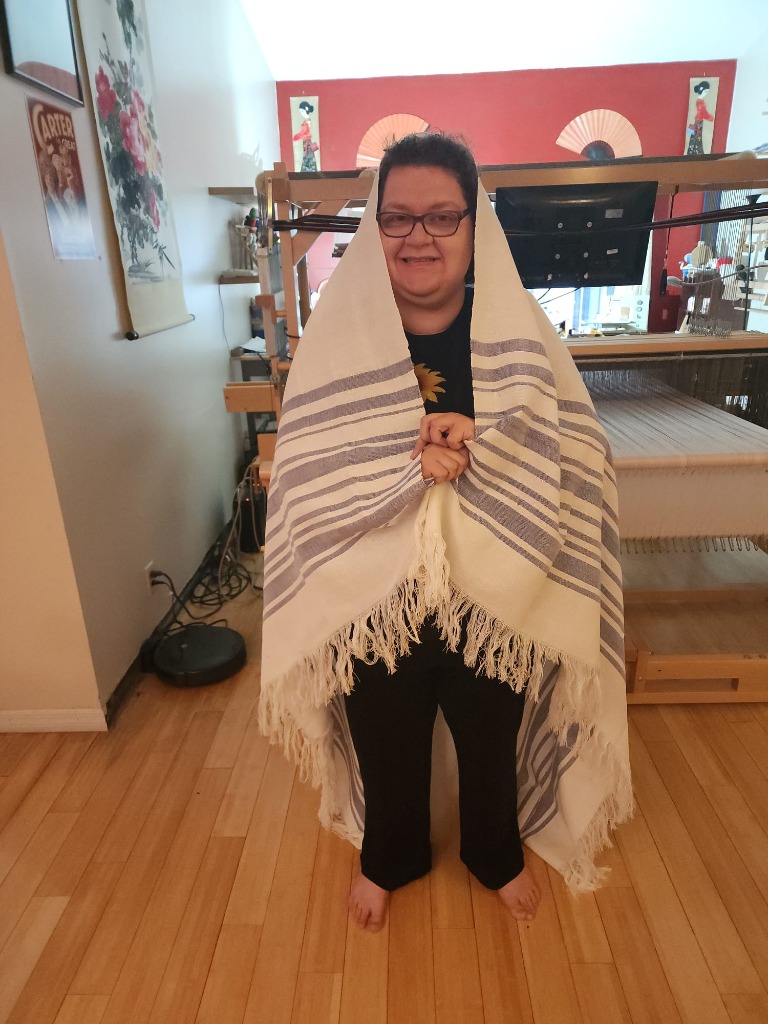 Leslie wrapped in her woven Tallit